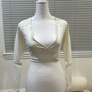 Gigi C Tina Wrap Top Womens XS White Laser Cut Long Sleeve Crop Tie Waist